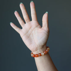 sheila of satin crystals wearing a carnelian bracelet