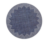 The Kim Seybert Dream Weaver Placemat Set of 4 in Navy & White features round placemats with a zigzag inner pattern and radiating white border lines for a striking sunburst effect against a plain background.