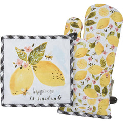 Set of kitchen items with lemon design including a pot holder, oven mitt, and towel.