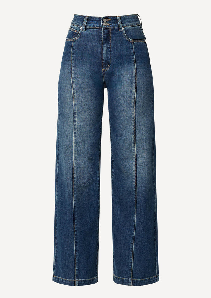 A pair of wide leg, high rise jeans in medium dark blue wash with seam down center leg.