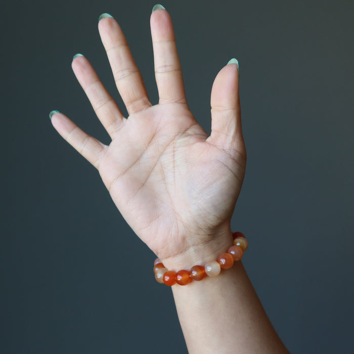 sheila of satin crystals wearing a carnelian bracelet
