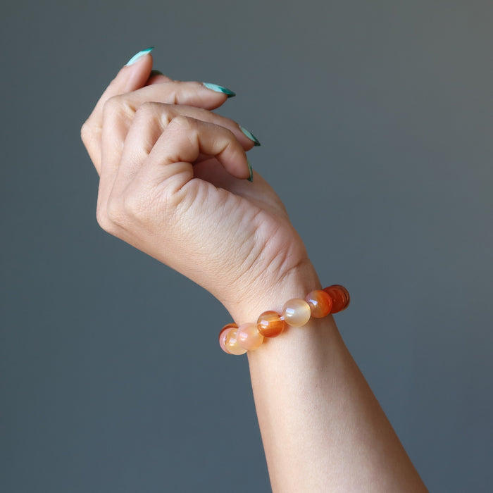 sheila of satin crystals wearing a carnelian bracelet