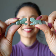 sheila of satin crystals holding Green Aventurine Tigers