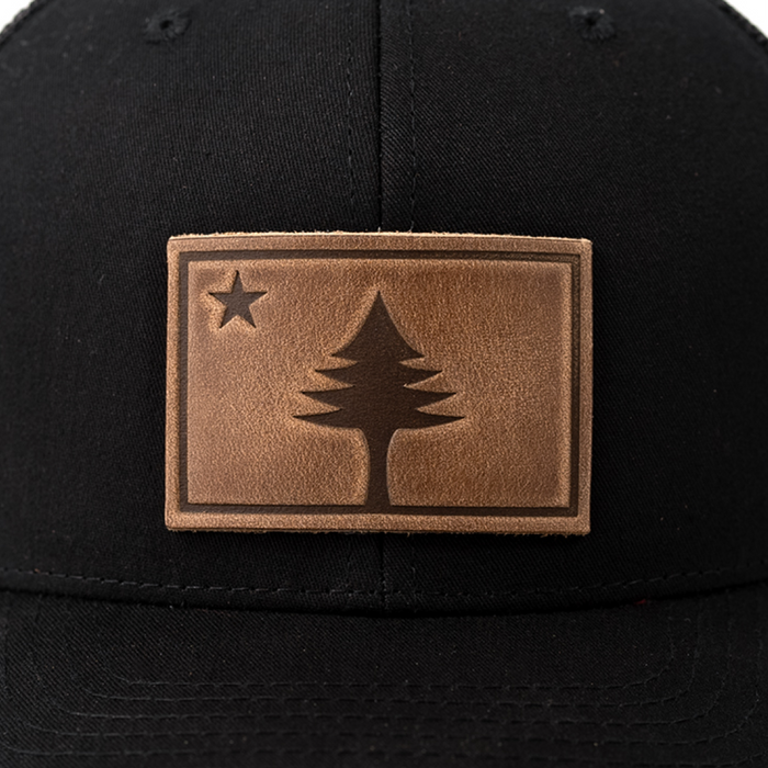 Maine Flag Hat | Leather Patch Trucker Hat: Charcoal