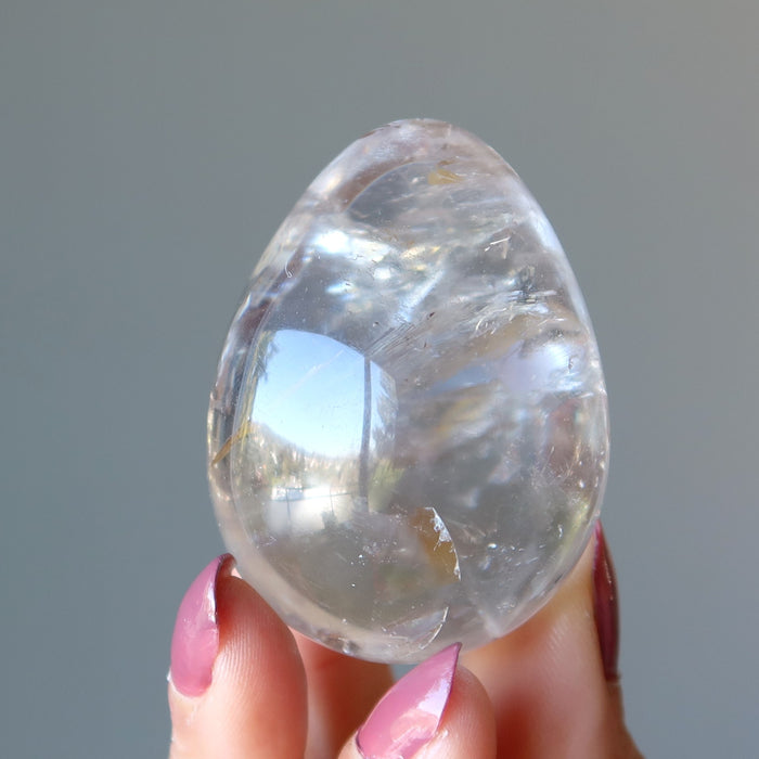 holding Smoky Quartz Egg