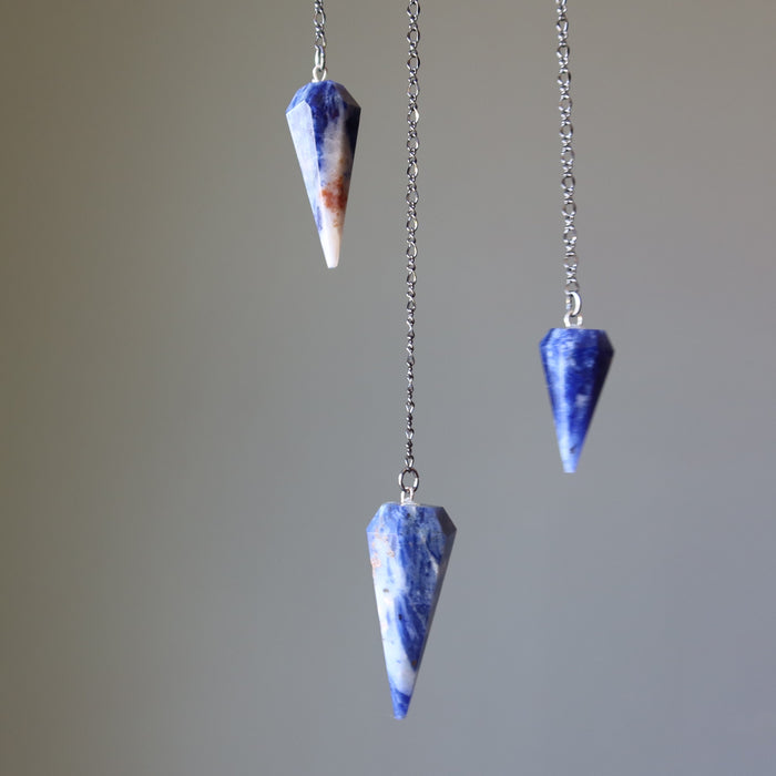 three sodalite pendulums