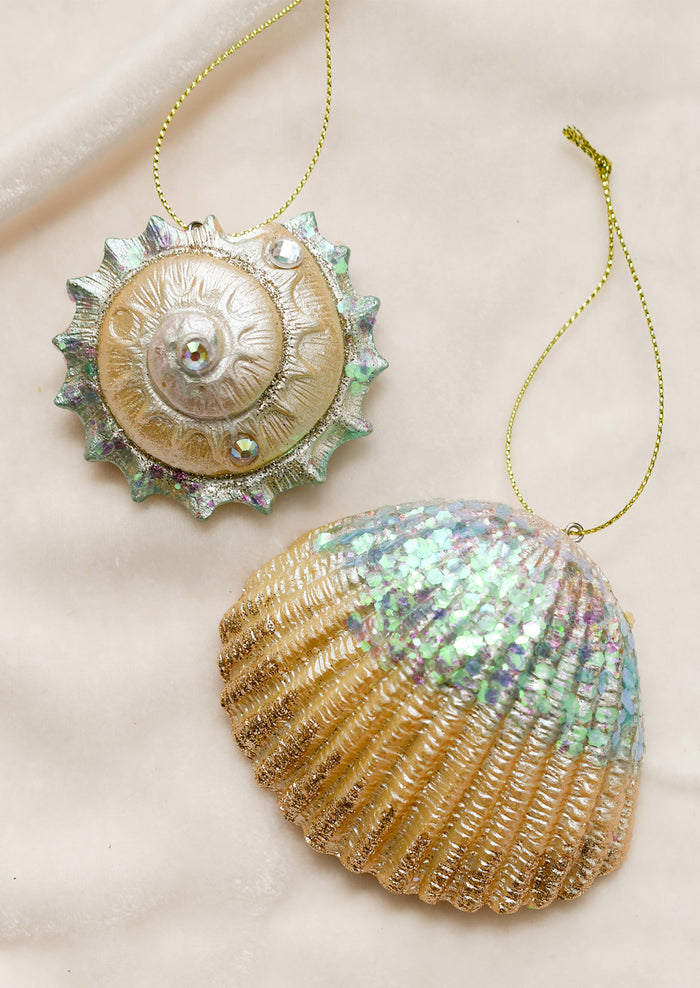 Shell ornaments with glitter detail.