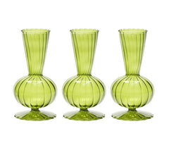 The Kim Seybert Tess Bud Vase Set of 3 in Olive features identical green glass vases with bulbous bases, narrow necks, flared openings, and elegant vertical stripes, arranged in a row against a white background.