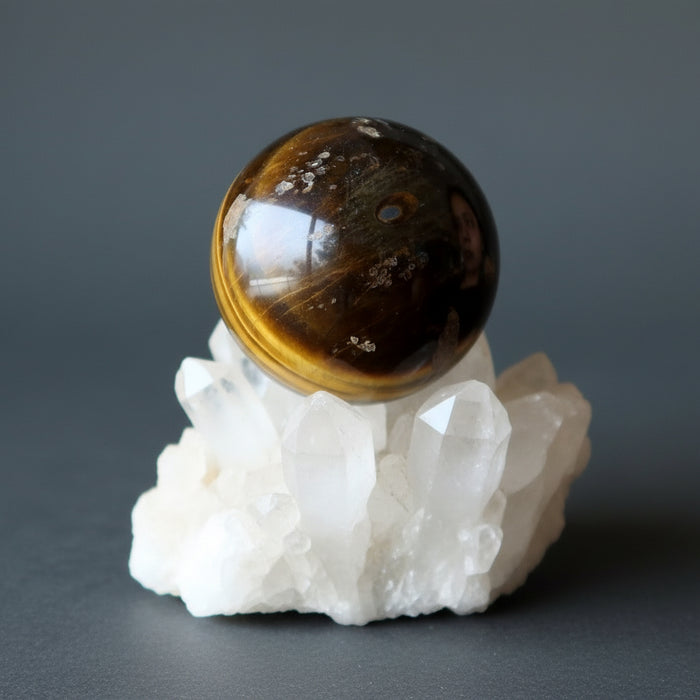 Den Muddy Earth Tigers Eye Sphere